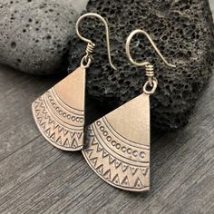 Simple yet beautiful silver triangular earrings, with small hand stamped details. Perfect earrings for any occasion, easy to match to any outfit. This are flat and light weight what makes them easy to wear. A pair to wear and never take off. They are 3.4cm- 1.45inch long 3.3cm- 1.30inch wide. They have a drop length of 5cm- 2 inch A unique addition to your jewelry collection. To see more unique silver earrings, click the link below https://www.etsy.com/shop/AkashiJewelry?ref=seller-platform-mcna Stamped Metal Earrings For Gifts, Triangle Metal Earrings For Gift, Sterling Silver Triangle Earrings For Pierced Ears, Handmade Triangle Sterling Silver Jewelry, Handmade Sterling Silver Triangle Jewelry, Sterling Silver Triangle Jewelry With Matching Earrings, Nickel-free Triangle Sterling Silver Jewelry, Nickel-free Silver Triangle Jewelry, Nickel Free Triangle Metal Earrings