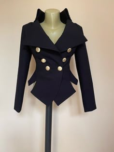 Stylish Extravagant women's black jacket. Fully lined. Length 58cm at back. It is made of lightweight polyester fabric with option for gold or silver buttons. Buttons are fabric covered with gold or silver shiny fabric. SIZE CHARTSIZE S - US 6, UK 8, EU 36bust: bust around 34.5”/90cmWaist: waist around 27.5”/70cmHips: hips around 34.5”/90cmSIZE M - US 8, UK 10, EU 38bust: bust around 37.5”/95cmWaist: waist around 29.5”/75cmHips: hips around 37.5”/95cmSIZE L - US 10, UK 12, EU 40bust: bust around Goth Blazer, Rafia Hat, Steampunk Black, Party Jacket, Asymmetrical Coat, Party Jackets, Stylish Coat, Shiny Fabric, Altering Clothes