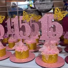 pink and gold birthday hats with butterflies on them