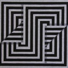 a black and white pattern with squares on it