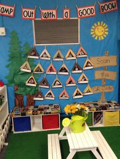 a classroom display with colorful books and decorations