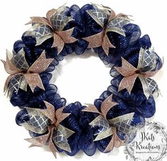 a blue wreath with gold stars on it