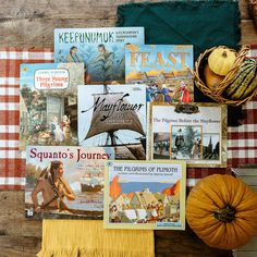 there are many books on the table with pumpkins and other items to read about them