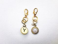 Letter Y Charm Add a personalized touch to with letter charms! This can be used as a gold keychain charm, backpack charm or charm bracelet accessory. The letter clip on charm includes an 18k gold plated lobster clasp. The 18mm clasp is nickel free. A pearl and rhinestone bead embellishment are included on the backside of the charm. About shopping with Shayla Michelle:  When you shop with Shayla Michelle you'll see attention to detail and a focus on customer experience. Products are packaged with Gold Bags With Logo Charm, Gold Keychain Bag Charm For Everyday Use, Luxury Tarnish-resistant Gold Charms, Personalized 14k Gold-filled Charms For Gifts, Gold Logo Charm Bag Charm, Business Backpack, Clip On Charms, Backpack Charm, Wooden Hoop