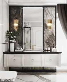 an elegant bathroom with marble and gold accents