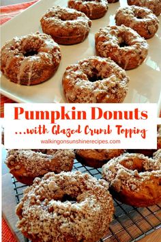 pumpkin donuts with sugared crust toppings on a cooling rack in front of a white plate