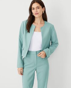 Elevate your wardrobe with the Petite Crew Neck Jacket in Peacock Teal Melange from Ann Taylor. This jacket combines modern suiting with classic elegance, tailored to flatter and versatile enough to complement any ensemble.

- **Size:** Petite 00
- **Color:** Peacock Teal Melange
- **Material:** 66% Polyester, 32% Viscose, 2% Spandex
- **Gender:** Female
- **Features:**
  - Crew neck design
  - Long sleeves with functional buttons for styling versatility
  - Front hook-and-eye closure
  - Front Muted Turquoise, Peacock Teal, Female Features, Color Peacock, Soft Mint, Black Suit Jacket, Knitted Suit, Work Clothing, Single Button Blazer