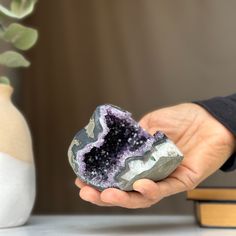 This deep purple amethyst geode cave has the highest quality of the semi precious stones. This geode has beautiful large crystals and agate bands. Combine design and wellness by adding an amethyst geode to the decoration of your spaces.Its vibrant deep purple color is characteristic of the geodes extracted from URUGUAY, one of the few places in the world where you can find. YOU WILL RECEIVE THE PIECE OF THE PICTURE!! ✧ MEASURES:Height: 3 in. x Width: 4 in. Weight 1 lb (467 gr). Healing Purple Geodes With Natural Stones, Purple Amethyst Geodes With Natural Stones, Healing Amethyst Geodes, Amethyst Geodes For Healing, Geode Cave, Third Eye Chakra Stones, Deep Purple Color, Amethyst Geode, Stone Wrapping