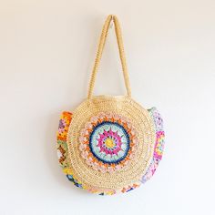 In stock fast shipping from Los Angeles! The Elena Handbags Boho Round Beach Straw Tote is the perfect accessory to elevate your summer style. Handcrafted with eco-friendly woven straw, this stunning boho shoulder bag is sure to make a statement whether you're beach-going, yoga-practicing or running everyday errands. Carry your essentials in style with this chic and sustainable tote. Zipper closureFully linedInside pocketStrap drop: 11 inchesSize: 17.5 in diameter Designer Style ID: 8627 Boho Ro Boho Shoulder Bag, Running Everyday, Summer Beach Bag, Bag Summer, Straw Bags, Straw Tote, Raffia Bag, Denim Bag, Bag Handmade