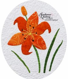 an orange flower with green leaves in the center on a white paper circle that says scriven quilting