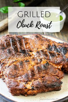 grilled chuck roast on a white plate