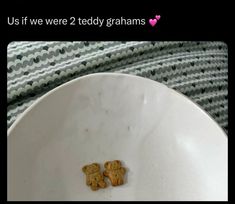 two teddy bears in a white bowl on top of a table cloth with the caption us if we were 2 teddy grahams