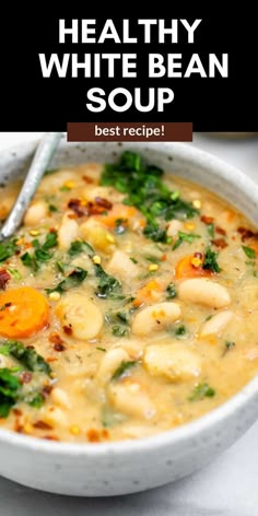 white bean soup with carrots and spinach in a bowl