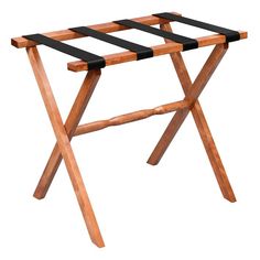 a wooden folding table with black straps on it's legs and an open top