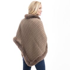 Elevate your cold-weather wardrobe with the FurTrimmed CozyCable Poncho, a luxurious blend of warmth, style, and sophistication. This cable knit poncho is crafted from soft 100% polyester, offering a cozy feel while draping beautifully over your shoulders. The warm brown hue adds richness and depth, while the fancy faux fur trim along the neckline and edges brings an extra touch of elegance. Designed with the flexibility of a poncho, this piece is perfect for layering over your favorite outfits. Cable Knit Outerwear In One Size, Winter Cable Knit Outerwear One Size, Cozy Knitted Winter Cape, Cozy Cape For Cold Weather, Winter Wool Poncho For Cold Weather, Winter Chunky Knit Poncho, Cable Knit Poncho, One Size For Winter, Winter Cable Knit One-size Poncho, One Size Winter Cable Knit Poncho