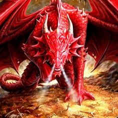 a red dragon sitting on top of a pile of dirt