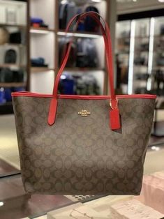 New Coach 5696 City Tote Bag in Signature Coated Canvas, Brown Red $350 NWT. Coach Tote Bag Outfit, Addias Outfits, Tiffany's Jewelry, Dream Handbags, Coach City Tote, Tote Bag Outfit, City Tote Bag, Coach Tote Bag, 2024 Goals