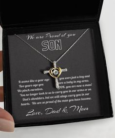 "Cross Necklace For Son | Gift For Son | To My Son Cross Necklace | Son Necklace | Birthday Gift For Son | Card Gift For Son From Mom And Dad - Cross Dancing Necklace: Weight: 0.14 oz Stunning .925 Sterling Silver necklace.  AAAA grade cubic zirconia jewels set throughout the cross. Featuring a \"dancing stone\" centerpiece that is a large AAAA grade cubic zirconia stone. The gold heart is triple plated in 14K gold. Polished to perfection. The pendant is 1 inch (25mm) in length and 0.85 inch (21 Cross Necklace For Birthday And Mother's Day, Cross Necklaces For Birthday And Mother's Day, For Son From Mom, Birthday Gift For Son, Dance Necklace, To My Son, Friend Mugs, Son Gift, Silver 925 Necklace