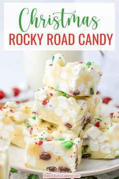 Christmas Rocky Road Candy- white chocolate combined with butter and peppermint extract to create a creamy base for mini marshmallows, candies, and macadamia nuts.  A perfect Christmas treat to serve at parties or give away as gifts.  via @Mooreorlesscook White Rocky Road Recipe, Christmas Rocky Road White Chocolate, Christmas Treats With Marshmallows, Christmas Rocky Road Recipe, Rocky Road Christmas, Christmas Bake Sale Ideas, Christmas Rocky Road, Christmas Dessert Platter, Rocky Road Candy