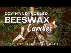 beeswax candles on a table with the words diy - hand - rolled beeswax candles