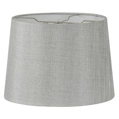 a grey lamp shade on a white background