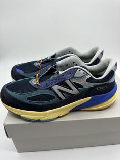 Get ready to step up your shoe game with these New Balance 990v6 sneakers! Embrace the vintage style with the multicolor lapis lazuli baklava design, perfect for any occasion. Made with suede upper material and a standard shoe width, these sneakers are both comfortable and stylish. The New Balance 990v6 Action Bronson edition is a must-have for any sneakerhead. With a UK shoe size of 6 and a US shoe size of 7, these sneakers are ideal for men who love athletic shoes. The New Balance 900 series product line is renowned for its quality and durability, and this particular model lives up to the hype. Don't miss out on the chance to own this amazing sneaker! Blue New Balance Sneakers With Air Cushioning, Blue New Balance Sneakers For Running Errands, Blue Sneakers With Ortholite Insole For Streetwear, Blue New Balance Low-top Walking Shoes, Blue Low-top Walking Shoes With Vibram Sole, New Balance Blue Walking Shoes With Round Toe, New Balance Blue Walking Shoes With Cushioned Footbed, Blue New Balance Walking Shoes With Cushioned Footbed, Blue Sneakers With Vibram Sole For Running Errands