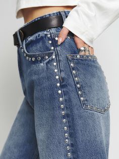 Tell your legs. The Cary is a high rise, loose fitting wide leg jean with a full length inseam and zip fly closure. Ropa Upcycling, Sustainable Denim, Studded Jeans, Wide Leg Denim, New Tops, Mode Inspiration, Denim Fabric, Wide Leg Jeans, Stretch Denim