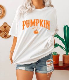 Retro Pumpkin Spice T-Shirt, Pumpkin T-Shirt, Thanksgiving Shirt, Autumn Vibes, Thankful Tee, Halloween Tee, Trend Fall Tee, Cozy Fall Tee, Comfort Colors ❤Welcome to Capellaa Designs,  If you are looking for clothes that suit your pleasure, you are in the right place! I would really like to offer you the best products. I love my job and are happy to offer you quality products. If you have any questions, concerns or requests regarding my products, feel free to ask me. This is my job and you can be sure that we will get back to you as soon as possible. ❤Sizing and Coloring When choosing the product, please pay attention to the size and color. In this way, I can deliver it to you in a shorter time. ❤Product Details Unisex T-Shirt: - Comfort Colors Brand -100% cotton ❤Shipping  After placing White Shirt With Text Print For Fall, White Short Sleeve Top For Halloween, Halloween Graphic Tee In White, Halloween White Graphic Tee, White Graphic Tee For Fall, White Halloween Graphic Tee, White Halloween Letter Print Top, White Short Sleeve Top For Fall, Retro Pumpkin