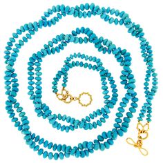 Two-Strand Turquoise Rondelle Necklace features an abundance of beads. It can be worn in many ways, from as-is to looping around the neck, creating a field of blue. A wire wrapped 18k yellow gold ring-and-toggle clasp featuring interlocking Vs holds everything in place. The entire necklace is 38.43 inches long. Rondelle Necklace, Wool Necklace, Yellow Gold Necklace, American Turquoise, Labradorite Necklaces, 18k Yellow Gold Ring, Keshi Pearls, Multi Strand Necklace, Natural Turquoise