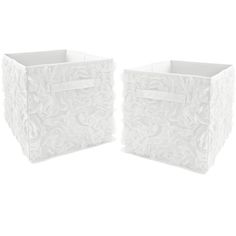 two white storage boxes with bows on them