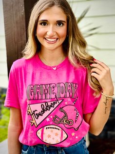 Introducing the PINK Game Day T-shirt - the perfect addition to your athletic wardrobe. Made with high-quality fabric, this shirt provides superior comfort and breathability for all-day wear. Show your team spirit in style with PINK. Fabric::: 50% cotton 50% polyester Sports Team Name Pink T-shirt, Pink Short Sleeve T-shirt For College, Summer Game Day T-shirt With Team Name, Team Name T-shirt For Game Day In Summer, Pink Tops With Team Name For Fan Gear, Pink Crew Neck T-shirt For Game Day, College Pink Graphic Print T-shirt, Pink Graphic Print T-shirt For College, Pink Crew Neck T-shirt For Sports Events