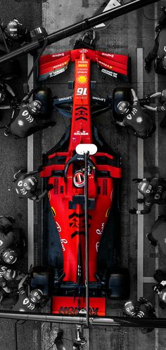 an overhead view of a red race car