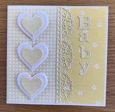 a close up of a greeting card with hearts on the front and back of it