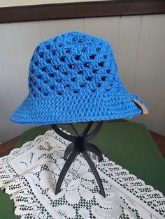 A granny stitch sun hat made from 100% cotton. Machine washable (gentle cycle, cold water); hang or lay flat to dry. Cotton Hats For Outdoor Use, Blue Cotton Sun Hat For Outdoor Use, Blue Cotton Sun Hat For Outdoor, Adjustable Summer Crochet Hat In Cotton, Adjustable Summer Crochet Cotton Hat, Spring Cotton Adjustable Crochet Hat, Spring Adjustable Cotton Crochet Hat, Adjustable Cotton Crochet Hat For Spring, Adjustable Crochet Sun Hat For Outdoor