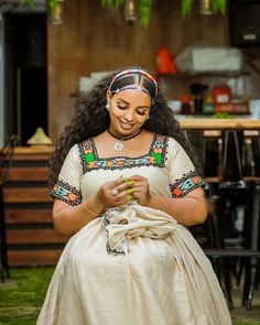 This elegant cream-colored Habesha dress is the perfect choice for celebrating Ashenda. As an Ethiopian traditional dress, this Habesha Kemis combines cultural authenticity with a refined, modern look. Its soft cream hue and intricate details make it an ideal outfit for this special occasion, honoring tradition with style. Material Cotton Thread Estimated delivery : 1 week to 2 weeks Contact WhatsApp +1(304)-306-2784Email: contact@ethiopian.store Traditional Short Sleeve Beige Dress, Traditional Beige Short Sleeve Dresses, Traditional Fitted Cream Dress, Habesha Dress, Ethiopian Traditional Dress, Habesha Kemis, Traditional Dress, Cotton Thread, Intricate Details