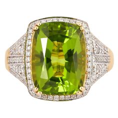 This collection features an array of pretty peridot rings! Accented with diamonds these rings are made in yellow gold and present a vibrant and fresh look. Classic peridot ring in 18K yellow gold with diamonds. Peridot: 6.520 carat cushion shape. Diamonds: 0.3902 carat, G colour, VS clarity. Gold: 5.29g, 18K yellow gold. Ring Size: US 6.75 - Size can be adjusted for free upon request - please reconfirm with your order. R642 Luxury Green Gemstones With Halo Setting, Exquisite Green Diamond Ring With Accents, Formal Peridot Diamond Ring In Yellow Gold, Luxury Peridot Ring For Formal Occasions, Luxury Yellow Gold Peridot Rings, Luxury Peridot Rings With Accent Stones, Elegant Lime Green Diamond Jewelry, Luxury Green Diamond Ring With Pave Setting, Peridot Rings With Brilliant Cut In Fine Jewelry Style