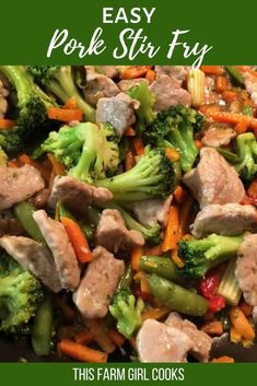 stir fry with broccoli, carrots, and meat in a wok