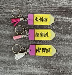 "Personalized Teacher Key Chains Pencil Key Chains Custom Acrylic Key Chains Teacher Appreciation Gift Teacher Gifts Custom Teacher Key Chain Perfect gift to give a special teacher to show your appreciation for them! * Q U I C K * F A C T S * ✺ This listing is for one keychain only ✺ Material: Acrylic ✺ Color Of Key Chain: Yellow & Pink ✺ Size: 3\" x 1.5\" ✺ Tassel colors to choose from: White, Hot Pink, Soft Pink ✺ Writing is written in black vinyl ✺ Please note: these keychains are not dis Personalized Rectangular Craft Supplies For Gifts, Personalized Educational Stationery For Gifts, Personalized Pencil Craft Supplies For Gifts, Customizable Educational Craft Supplies For Gifts, Vinyl Personalized, Black Vinyl, Acrylic Colors, Teacher Appreciation Gifts, Teacher Appreciation