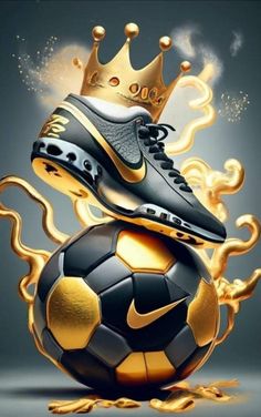 a soccer ball with a gold crown on top and a black shoe sitting on it