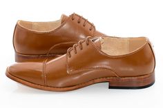 Elegant broguing outlines a vintage cap-toe design in this derby shoe featuring professional stylings and a handsome silhouette atop a flexible sole. Vintage Cap, Derby Shoes, Toe Designs, Derby, Dress Shoes Men, Oxford Shoes, Oxford, Dress Shoes, Lace Up