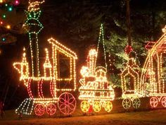 christmas lights on the side of a train