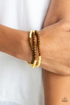 A collection of sunny yellow stones and dainty wooden beads are threaded along stretchy bands around the wrist for an earthy, layered look.   Sold as one set of three bracelets. Infinity Wrap, Yellow Bracelet, Rose Gold Beads, Silver Frames, Black Seed, Sunny Yellow, Yellow Stone, Paparazzi Accessories, Blue Gems