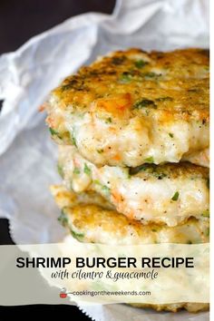 shrimp burger recipe with cilantro and guacamole on a white plate