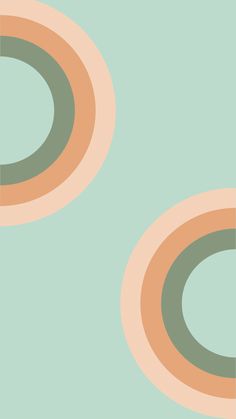 two circles are shown in the middle of a green and beige background with an orange center