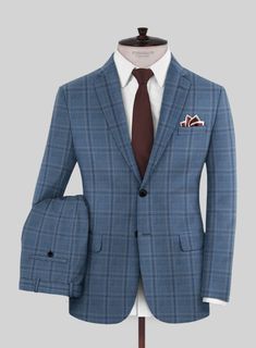 Looking to add a timeless piece to your collection? Our Reda Sky Blue Checks Wool Suit is a perfect choice! Made from rich wool fabric, it's ideal for winter wear and enhances your overall look with the utmost care given to both the fabric and tailoring. The cheerful blue hue interwoven with plaid weaves exudes a sense of serenity and peace, making it a versatile year-round option for wherever you go. 
  Look Includes    Reda     Sky     Blue     Checks     Wool  Fabric  Two Button Jacket Style Button Jacket, Formal Suits, Blue Check, Wool Suit, Loro Piana, Soft Wool, Blue Tones, Jacket Buttons, Black Button