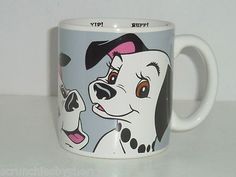 a coffee mug with a dalmatian dog on it