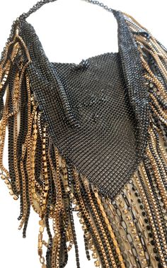 The dazzling chain necklace features all-over pave embellishments; It's the perfect way to add interest to a simple little black dress or jacket. Gunmetal, Silver, Gold, Black metal mesh, Copper,Crystal. Measures approximately 16 3/4"L.Lobster-clasp closure. If two of these necklaces are attached you can create a shoulder cover look. Necklaces are sold individually. Metal Chainmail Necklace For Party, Party Chainmail Metal Necklace, Chic Chain Link Necklace For Party, Luxury Metal Necklaces For Evening, Chic Evening Jewelry With Chain Link, Black Luxury Metal Chain Necklace, Luxury Black Metal Chain Necklace, Beaded Metal Chain Necklace For Party, Elegant Chainmail Necklaces For Party