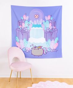 a pink chair sitting in front of a wall hanging with a cartoon cat on it