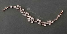 This CZ bridal bracelet is designed with round, teardrop and marquise jewels. Classic wedding day style or for any special occasion. Locking clasp, 7 inches long and .75 inches wide. Available in rhodium, gold or rose gold plate, AAA grade CZ, lead free. Formal Necklace, Dream Wedding Ring, Wedding Jewelry For Bride, Rose Gold Plate, Jewellery Wedding, Beaded Bracelets Tutorial, Cz Bracelet, Bangles Jewelry Designs, Wedding Accessories Jewelry