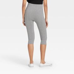 Keep your casual style on point with these High-Waist Cotton Blend Seamless Capri Leggings from A New Day™. These below-knee ankle leggings make a go-to pick whether you're hanging around the house or heading out casually. They feature a high-rise fit to create a flattering silhouette, along with a cotton gusset for breathable wear. Plus, the seamless leggings are crafted from soft, stretchy fabric for comfortable movement. Pair them with a range of tank tops, tees and sweatshirts, along with sn Seamless Casual Activewear With Tight Fit, Casual High Stretch Capris For Yoga, High Stretch Casual Capris For Yoga, Spring Seamless Biker Shorts, Casual High Stretch Workout Capris, Casual High Stretch Capri Bottoms, Casual Seamless Hip-length Bottoms, Casual Solid Knee-length Activewear, Casual High Stretch Capris